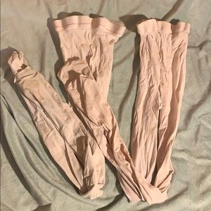 2 pairs of Bloch tights (footed)